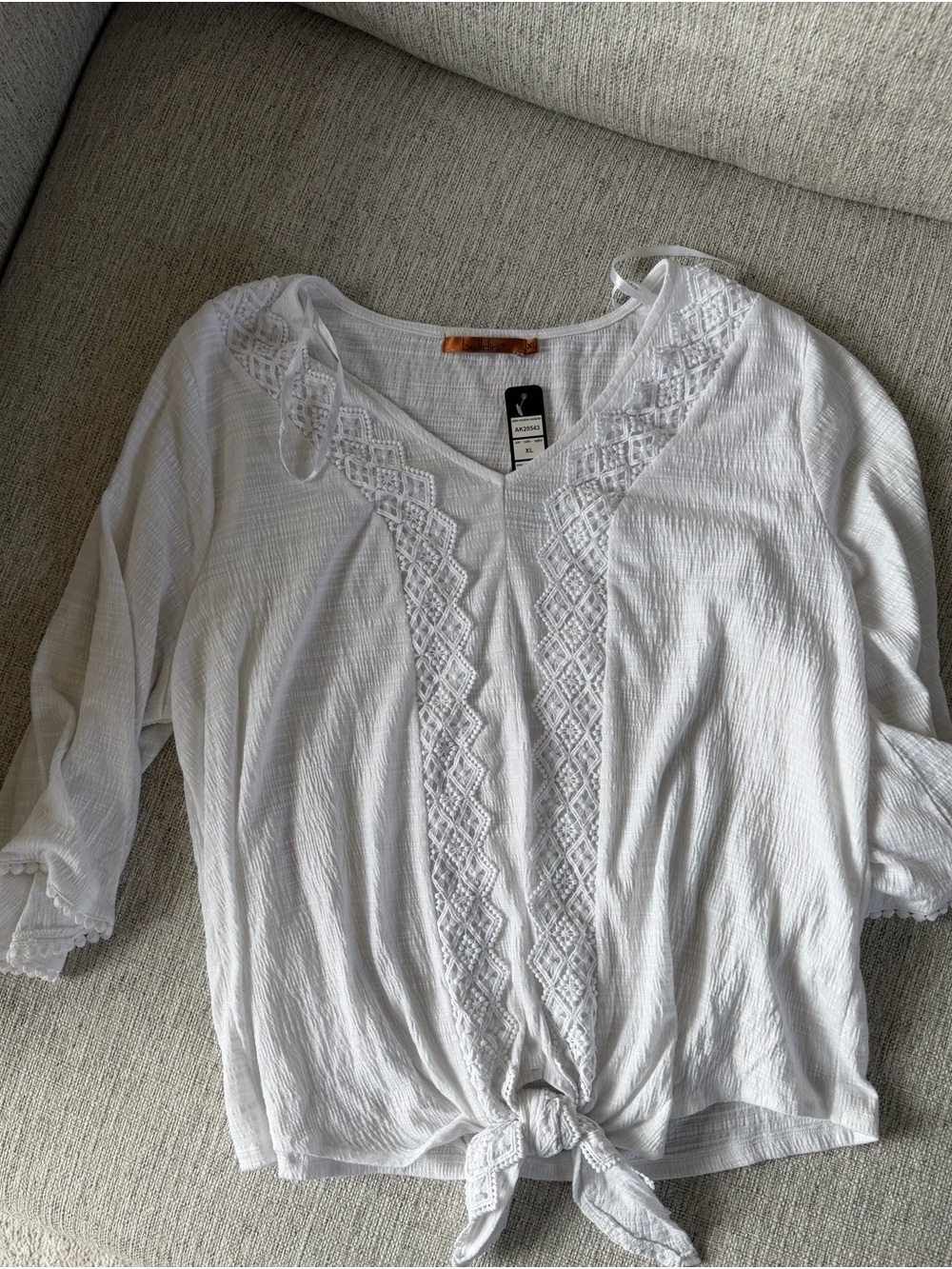 Belldini White Crochet-Detail Tie-Hem Blouse